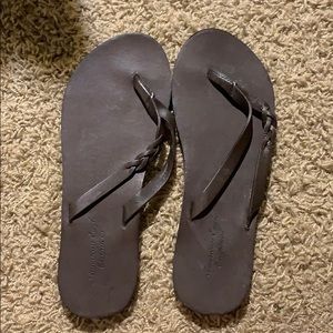 Brown flip flops. Never worn